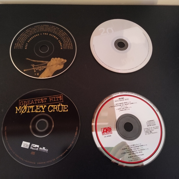 Other - Motley Crue, Ozzy Osbourne, Kiss and AC DC CDs (Free with purchase)